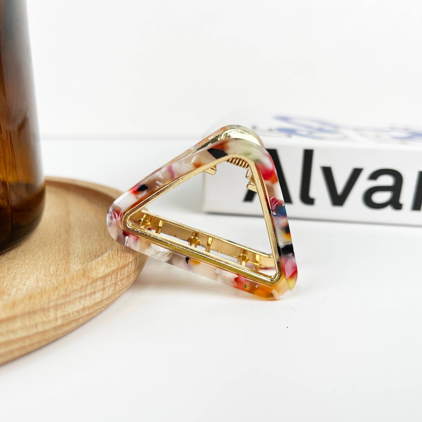 Pince à cheveux triangulaire