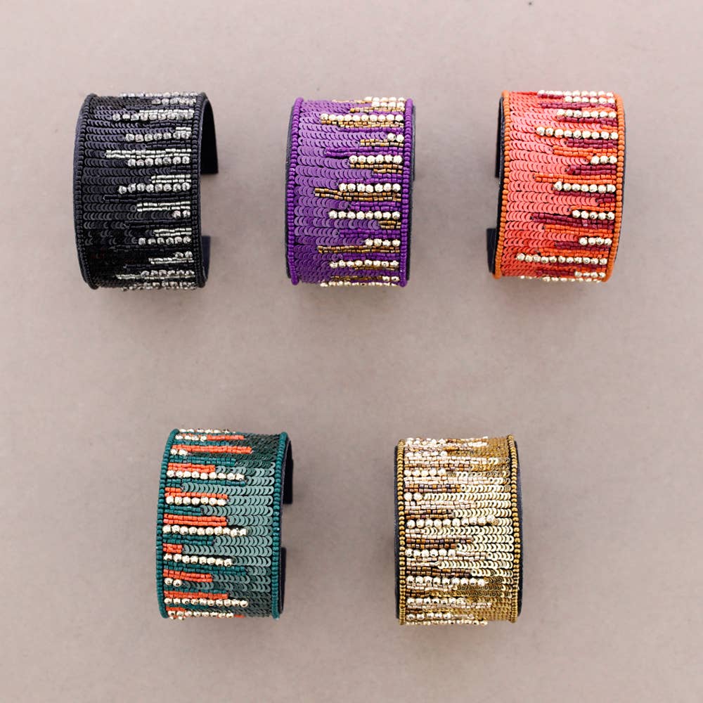 Manchette pluie de sequins orange