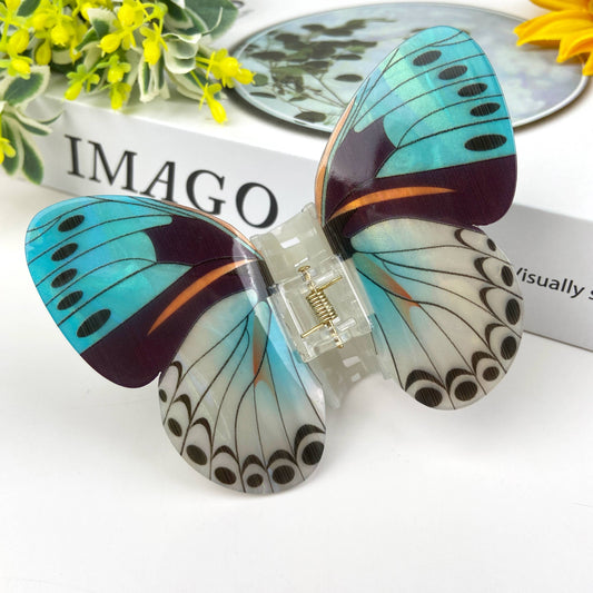 Pinces à cheveux papillon turquoise