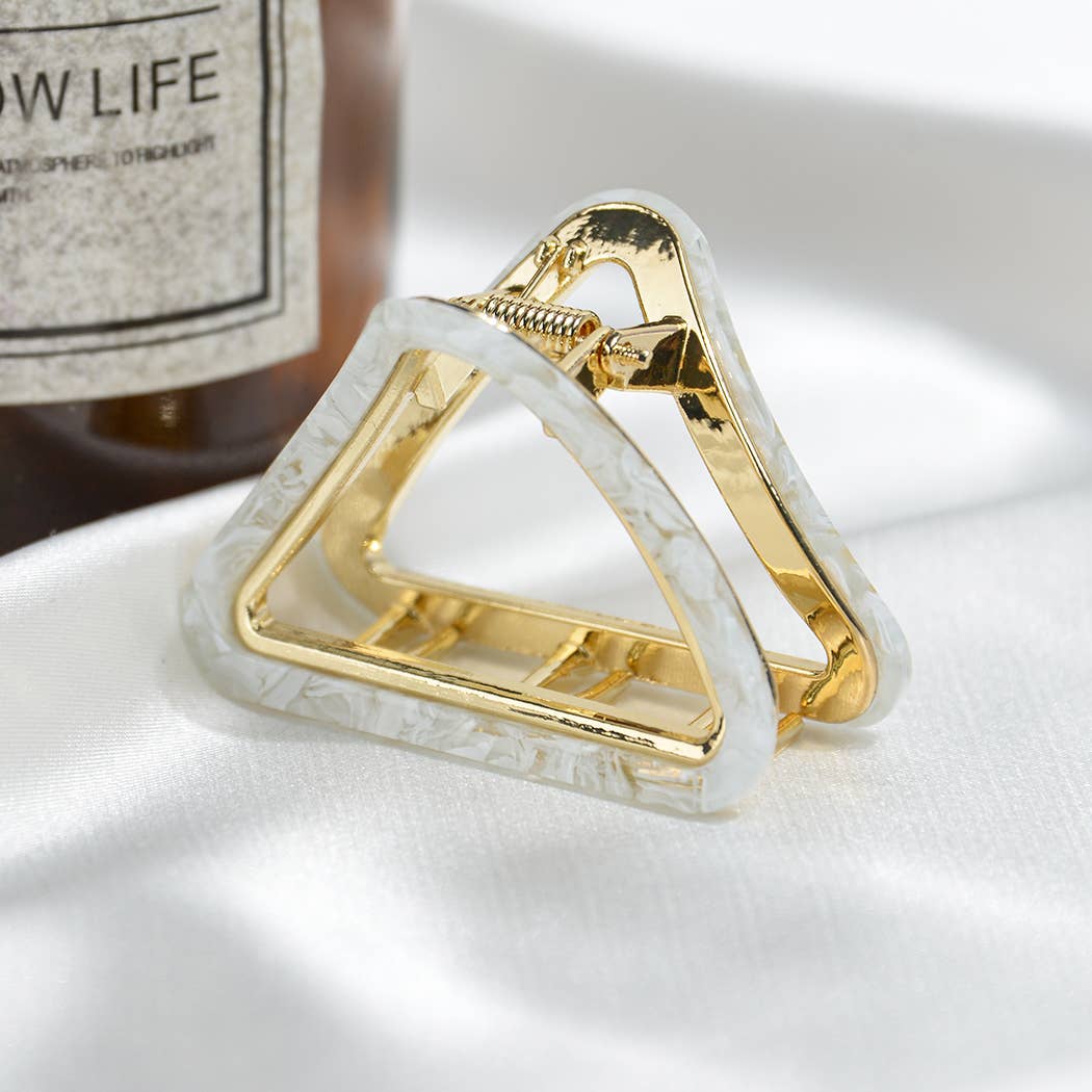 Pince à cheveux triangulaire