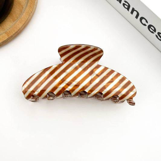 Pince à cheveux rayée  marron