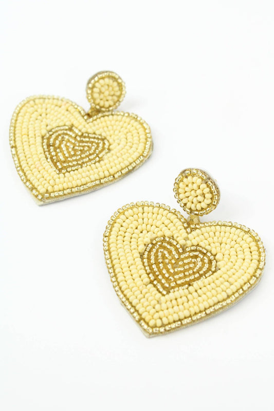 GOUTTE EN FORME DE CŒUR DORÉE ET CRÈME