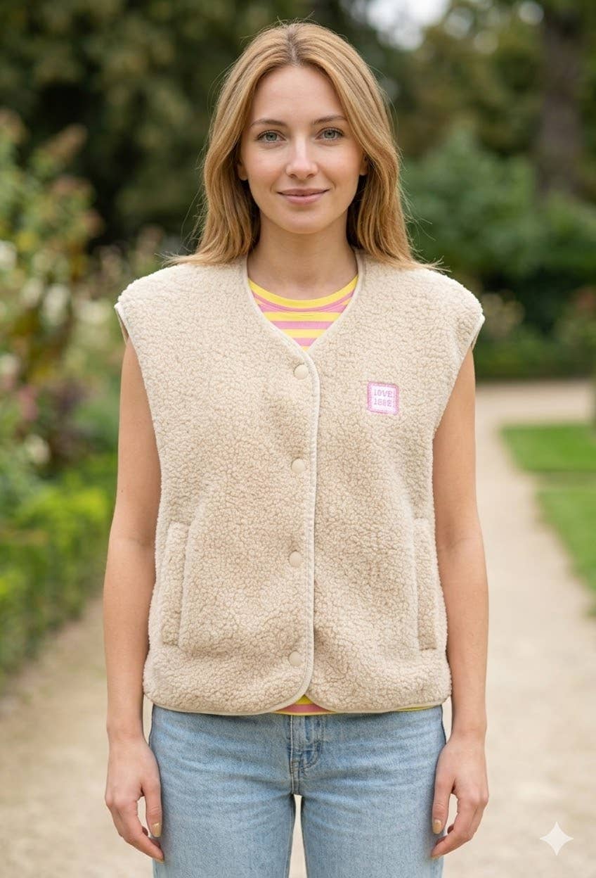 Gilet en fausse fourrure sans manches: Beige / Taille unique