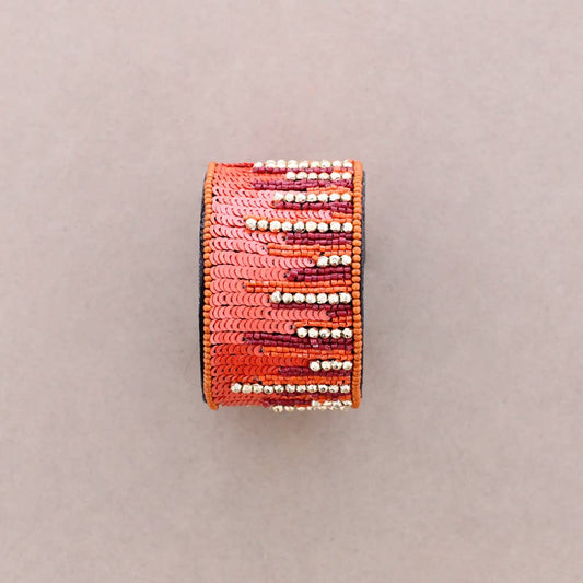 Manchette pluie de sequins orange