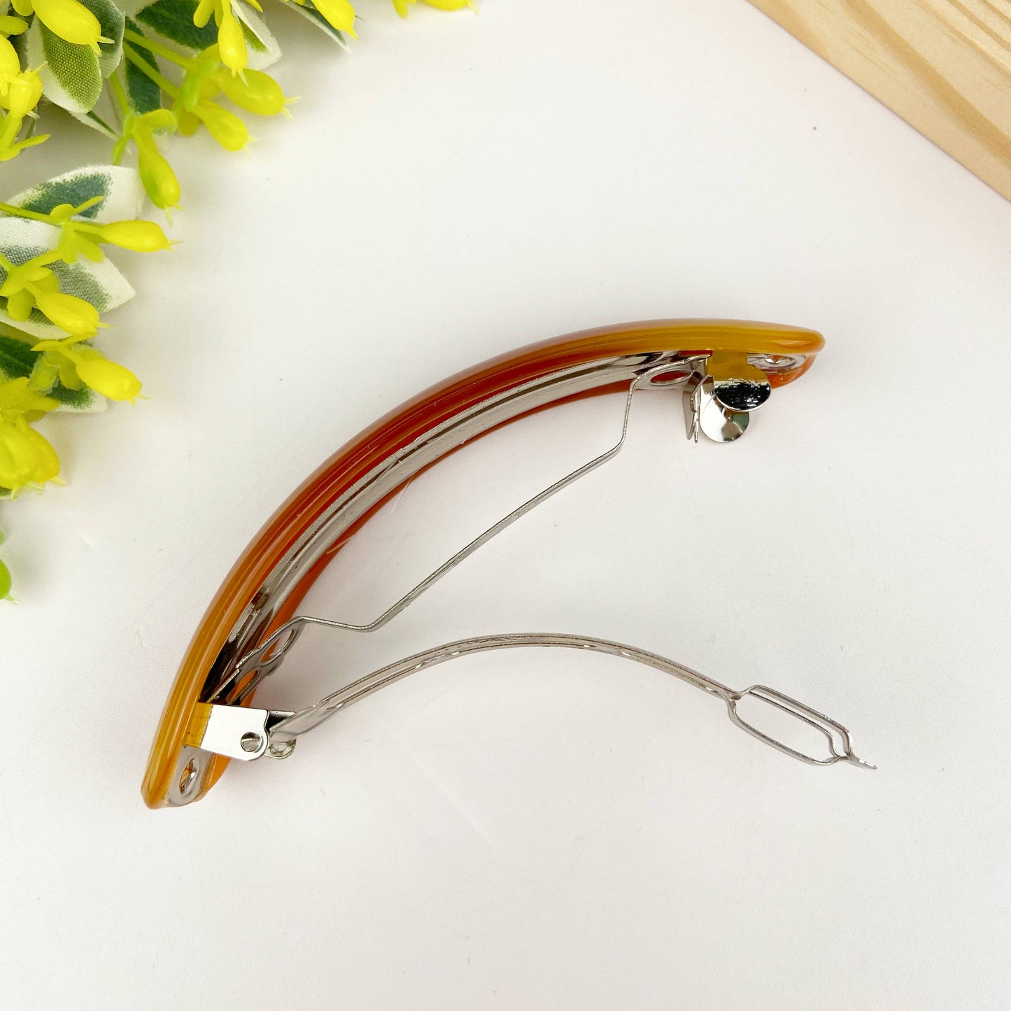 Barrette croissant en acétate: E - DupontDupont