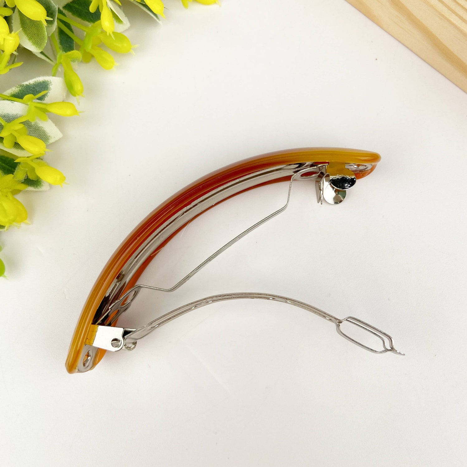Barrette croissant en acétate: E - DupontDupont