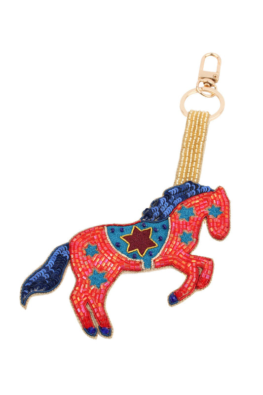 PORTE-CLÉS CHARMS DE SAC CHEVAL FOLK ROUGE ET BLEU - DupontDupont