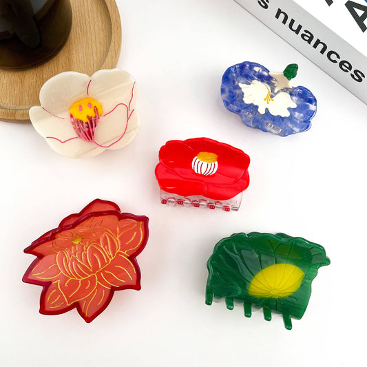 Pince à cheveux fleur de prunier rouge