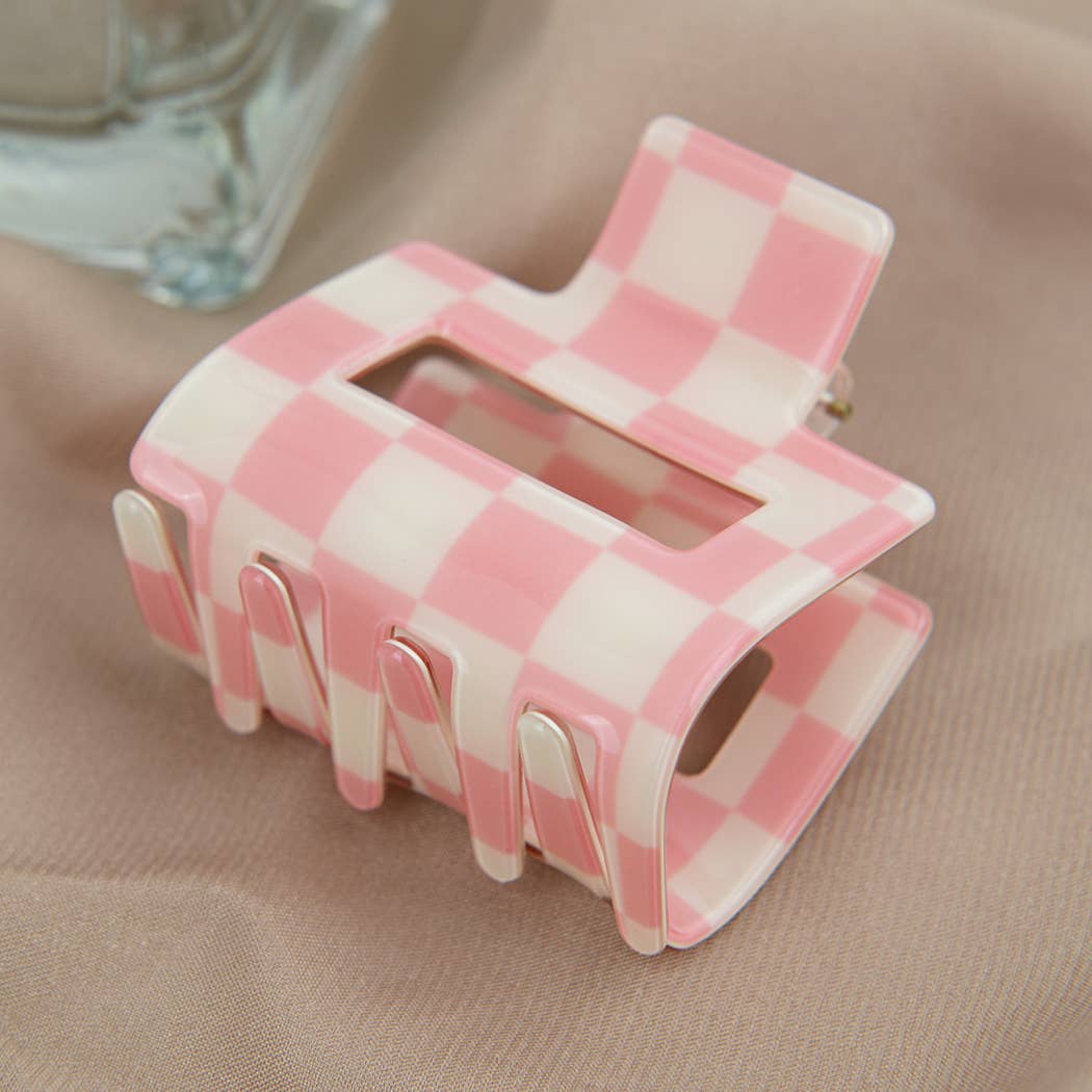 Pince à cheveux carrée damier rose